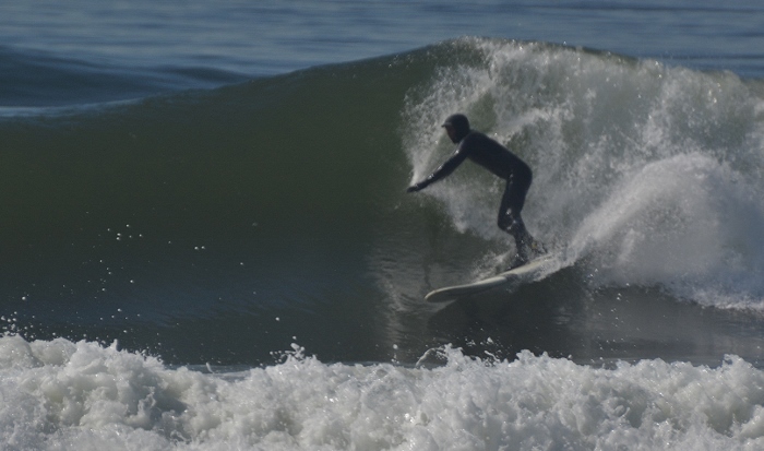 surfer riding a wave